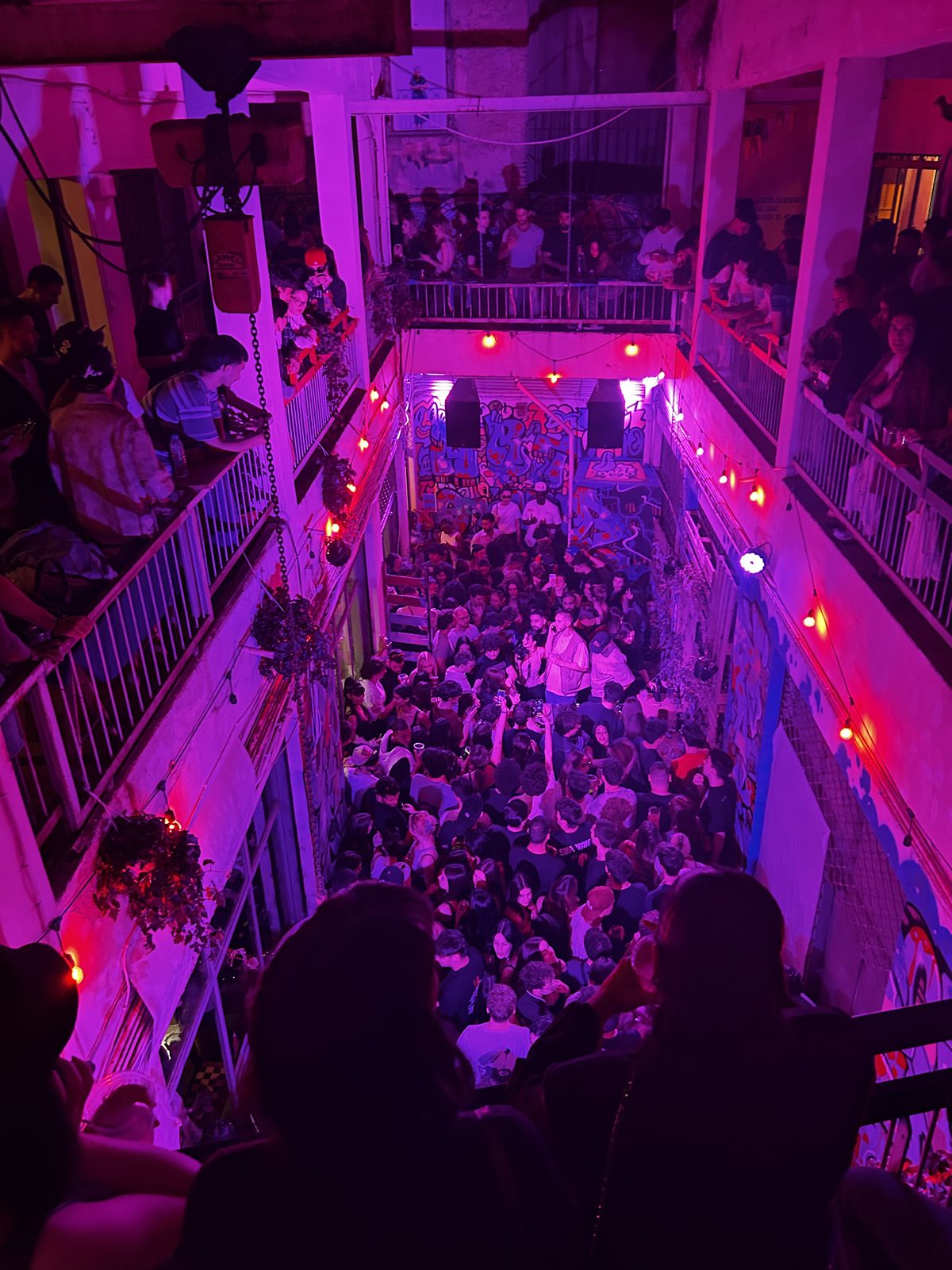 ARTHINA event — packed courtyard from balcony view