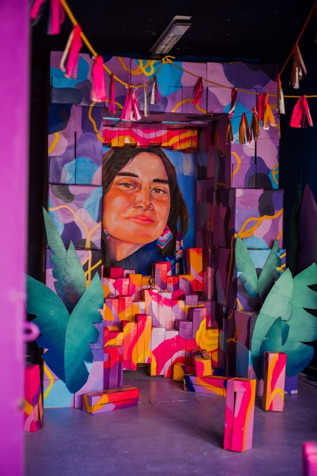 ARTHINA — cardboard portrait sculpture installation